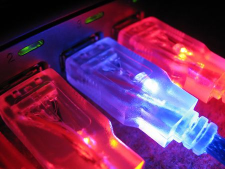 Luminous usb wires. Computer connection. New technologiesの写真素材