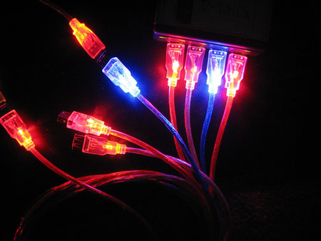 Luminous usb wires. Computer connection. New technologies