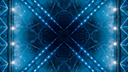 Bright lights shine down on water, creating reflections that form an interesting pattern. The scene captures the energy of an event at night with a vibrant atmosphere.の素材