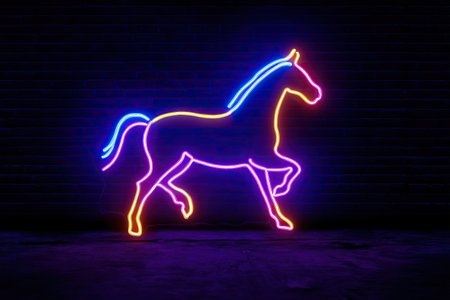 Neon silhouette of a horse on a brick wall in the dark. Neon illustration on a dark wall.の素材
