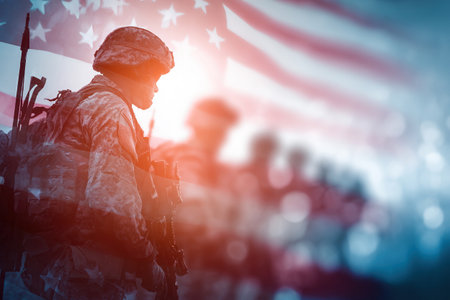 Blurred silhouettes of soldiers walking against a US flag. Double exposure. US Army concept. Army Day, Veterans Day, Remembrance Day.の素材