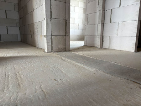New building. Smooth concrete surface made of block wall systemの写真素材
