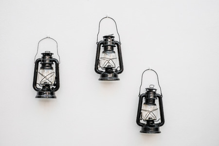 Old lamp on white wallの写真素材