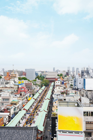 Business and culture concept - panoramic modern city skyline bird eye aerial view with Sensoji-ji Temple shrine - Asakusa district under morning blue sky in Tokyo, Japanのeditorial素材
