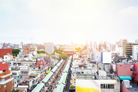 Business and culture concept - panoramic modern city skyline bird eye aerial view with Sensoji-ji Temple shrine - Asakusa district under dramatic sunrise and morning blue sky in Tokyo, Japanのeditorial素材