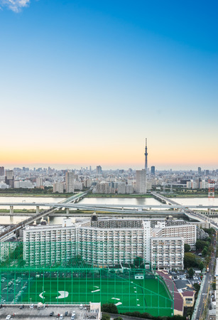 Business and culture concept - panoramic modern city skyline bird eye aerial view with tokyo skytree under dramatic sunset glow and beautiful cloudy sky in Tokyo, Japanのeditorial素材