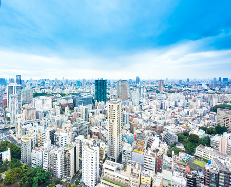 Business and culture concept - panoramic modern city skyline bird eye aerial view from tokyo tower under dramatic sunny and morning blue cloudy sky in Tokyo, Japanのeditorial素材