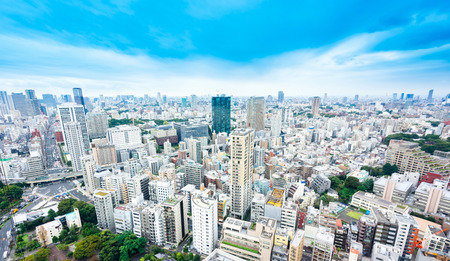 Business and culture concept - panoramic modern city skyline bird eye aerial view from tokyo tower under dramatic sunny and morning blue cloudy sky in Tokyo, Japanのeditorial素材