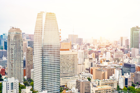 Asia Business concept for real estate and corporate construction - panoramic modern cityscape building bird eye aerial view from tokyo tower under sunrise and morning blue bright sky in Tokyo, Japanのeditorial素材