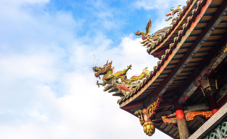 Asia culture concept - Roof with beautiful decoration of famous heritage landmark, the traditional old oriental Chinese temple, lungshan in Taipei, Taiwanのeditorial素材