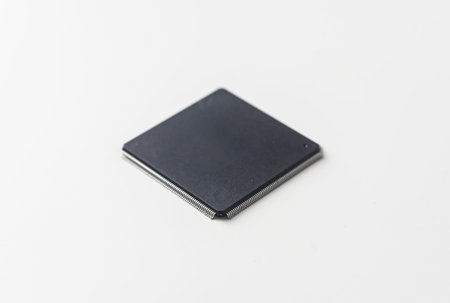 Business concept - semiconductor IC chip isolated on white background.