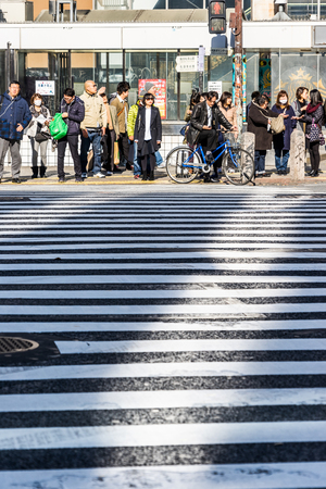 Tokyo, Japan - Dec 3, 2017: tourist walking on Shibuya crossingのeditorial素材