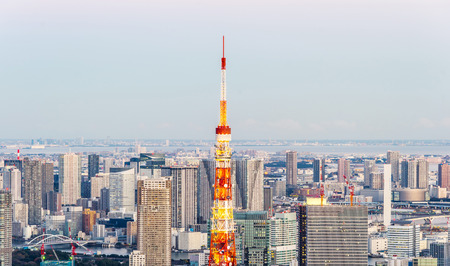 Asia Business concept for real estate and corporate construction - panoramic modern city skyline bird eye aerial view of tokyo tower and odaiba under golden sun in Roppongi Hill, Tokyo, Japanのeditorial素材