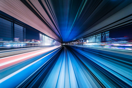 Business concept - high speed abstract MRT track of motion light for background in tokyo, japanの写真素材