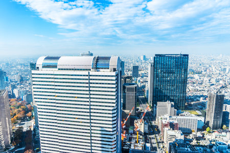 Asia Business concept for real estate and corporate construction - panoramic modern city skyline aerial view of Shinjuku area under blue sky in Tokyo, Japanの写真素材