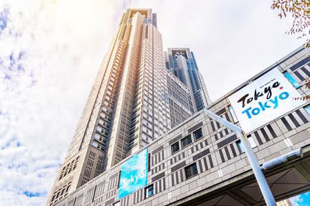 TOKYO, JAPAN - Nov.29 2017:  looking up view of Tokyo Metropolitan Government Building , skyscrapers reflect dramatic blue skyのeditorial素材