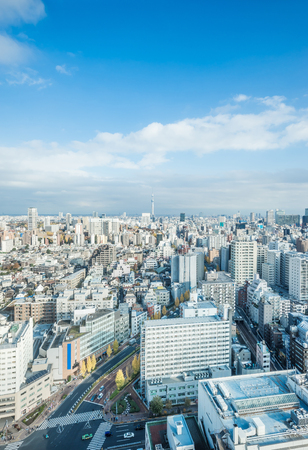 Asia business concept for real estate and corporate construction - modern city skyline aerial view of bunkyo under blue sky and cloud, tokyo, Japanのeditorial素材
