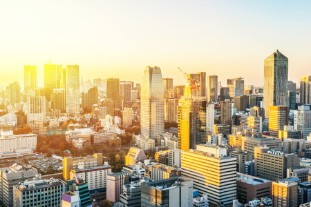 Asia business concept for real estate and corporate construction - panoramic urban city skyline aerial view under twilight sky and golden sun in hamamatsucho, tokyo, Japanのeditorial素材