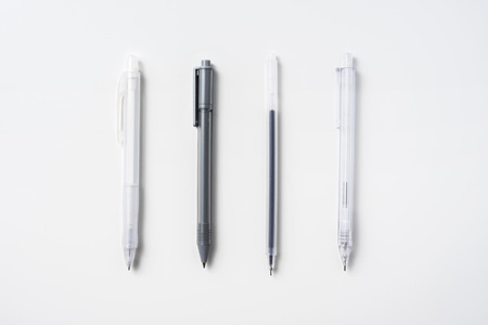 Top view of collection of mechanical pencil  on white background desk for mockupの写真素材