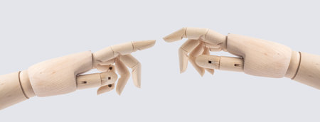 Business and design concept - wooden hand with start posture isolated on white background