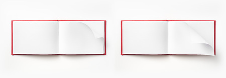 Design concept - Top view red hardcover notebook with open and flip curl rolled page isolated on background for mockupの写真素材