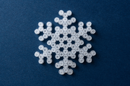 Design concept - simplicity white snowflake on blue backgroundの写真素材