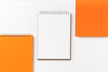 Design concept - Top view of 3 spiral notebook, white page isolated on background for mockupの写真素材