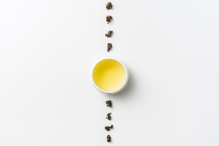 Asia culture and design concept - fresh taiwan oolong tea and cupの写真素材