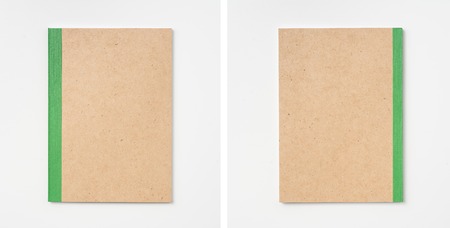 Design concept - Top view of kraft notebook isolated on white background for mockupの写真素材