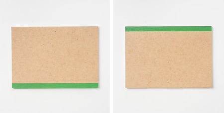 Design concept - Top view of kraft notebook isolated on white background for mockupの写真素材