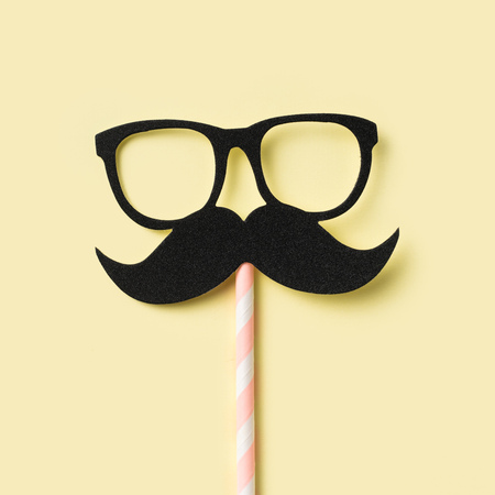 event design concept - top view of fathers day layout with silhouette of eye glasses and beard, copy space for mock upの写真素材