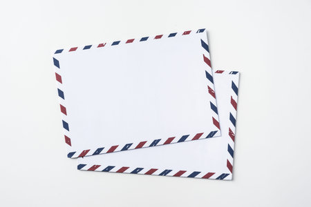 Top view of 2 post envelope isolated on white background desk for mockup