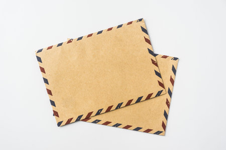 Top view of 2 post envelope isolated on white background desk for mockup