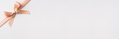 Design concept - top view of pink bow isolated on white background for mockup, it's real photo, not 3D renderの写真素材