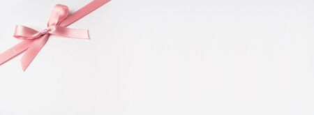 Design concept - top view of pink bow isolated on white background for mockupの写真素材