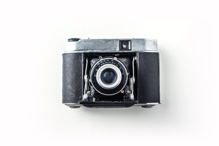 Top view of vintage cameras on white background desk for mockup