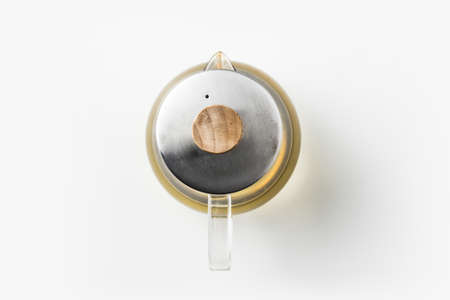 Top view of glass tea pot on white background desk for mockupの写真素材