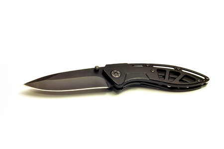 Black open steel pocket knife on white backgroundの写真素材