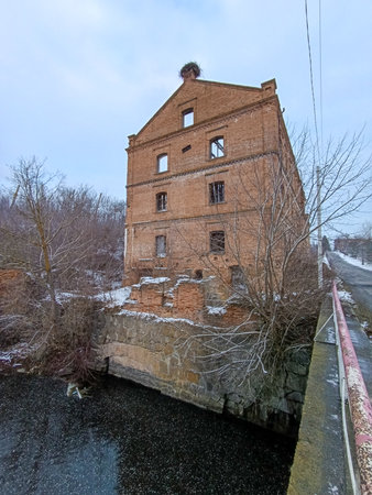 A large brick building sitting on the side of a road.の写真素材