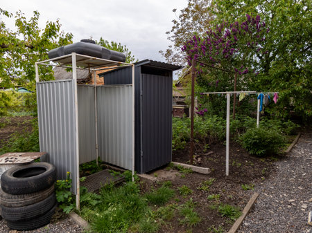 Summer shower, toilet and shini in the yard.
