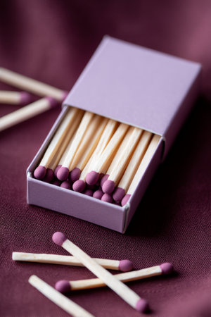 A box of matches sitting on top of a table.の素材