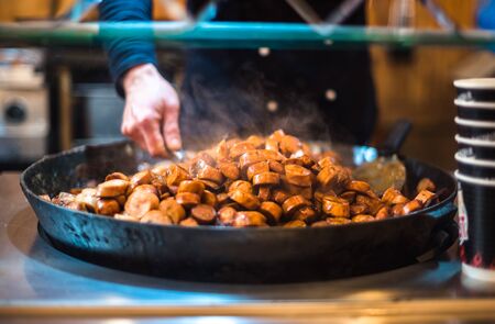 Christmas market uk manchester festival night winter holiday decoration people food delicious steamyの写真素材