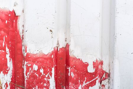 Rusty white red metal wall with yellow patterns. metal rust texture background constructionの写真素材