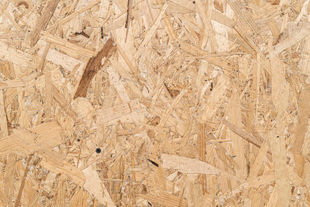 Background texture recycled compressed wood Construction hardboard space for text vibrant detail