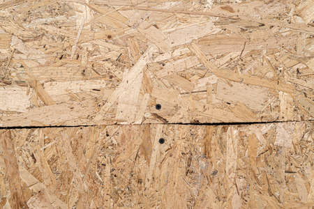 Background texture recycled compressed wood Construction hardboard space for text vibrant detail textureの写真素材