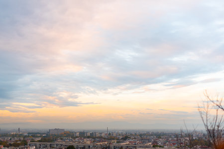Sunset over polluted smog city environmental question conversation concept ecology natureの写真素材