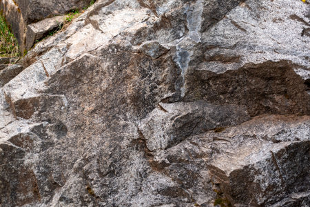 Textured stone background tiny cuts and hard surface