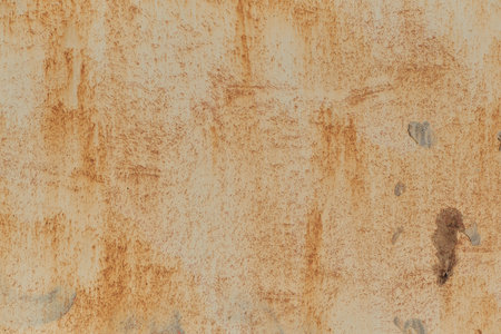 Plate of metal rusty texture with traces of a paint faint color corroded with age