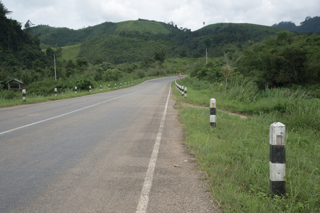 Back and white milestones of road to vang vieng laos PDRの写真素材