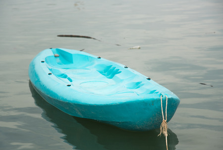 Blue cano boat on seaの写真素材